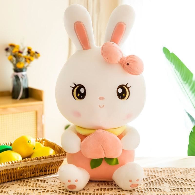 White rabbit plush with peach detail