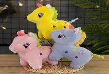 Pastel dinosaur plush toys