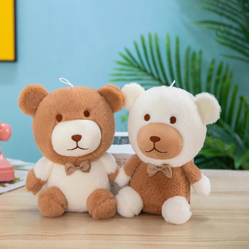Two teddy bear plush toys